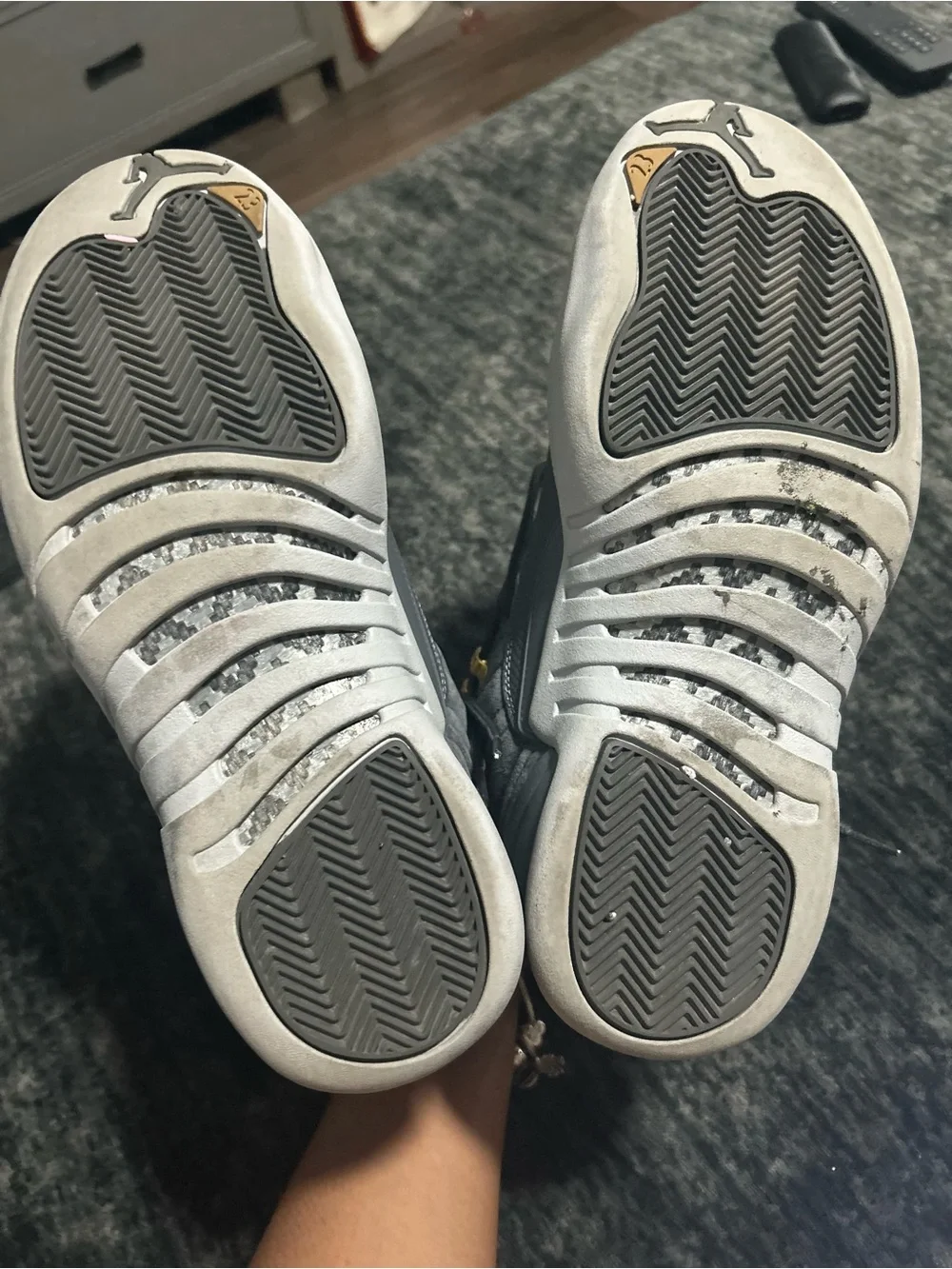 Jordan 12s Retro High Top Sneakers in Gray with Gold Accents